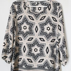 Women’s Cato blouse. Scoop neck. Multi color pattern. Black. Size large.